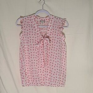 Pink Sleeveless Blouse with Bow Detail